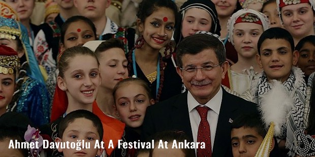 ahmet davutolu at a festival at ankara