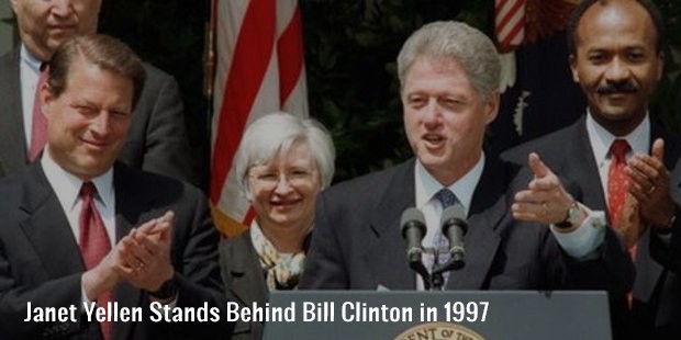 janet yellen stands behind bill clinton in 1997