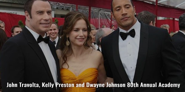 john travolta, kelly preston and dwayne johnson 80th annual academy