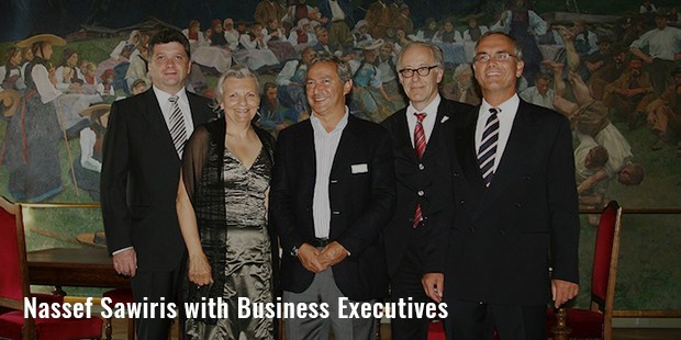nassef sawiris with business executives