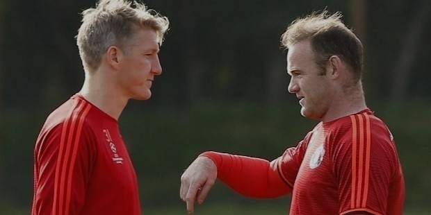 astian schweinsteiger and wayne rooney during training