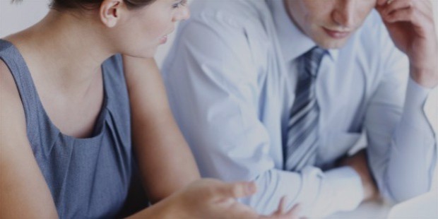 businessman and businesswoman discussing talking about work job