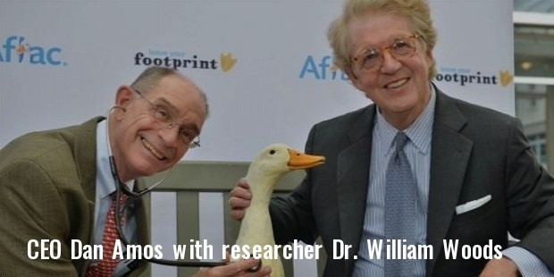 ceo dan amos  right  with researcher dr