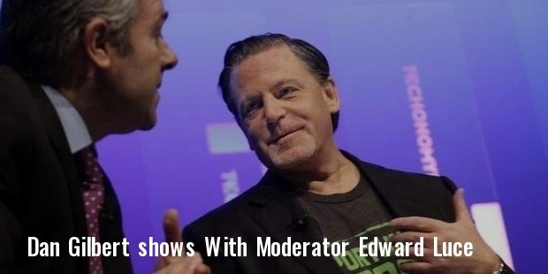 chairman dan gilbert shows moderator edward luce of the financial times