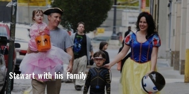 jon stewart and his wife tracey with kids nathan and maggie