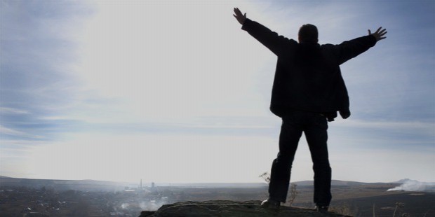 man on mountain silhouette