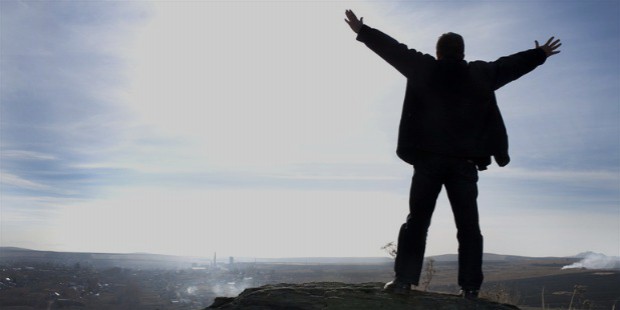 man on mountain silhouette