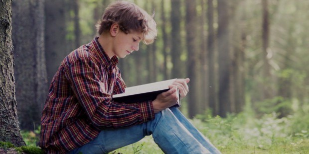 o teen boy reading book facebook 1056x528