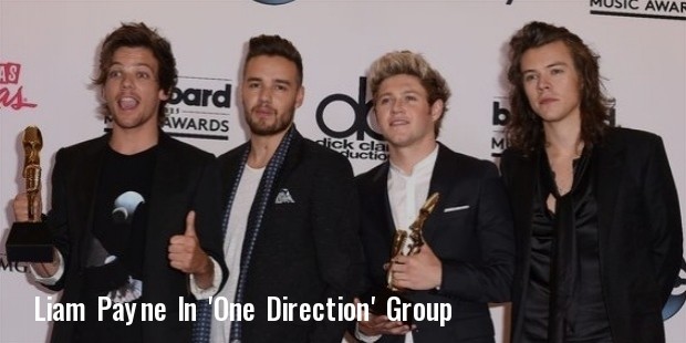 one direction winners of top touring artist and top duogroup pose in the press room during the 2015 billboard music
