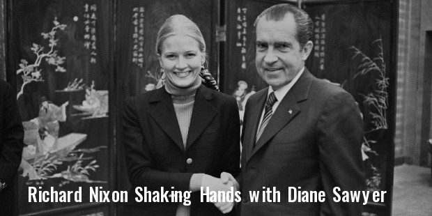 president richard nixon shaking hands with white house staff member diane sawyer 
