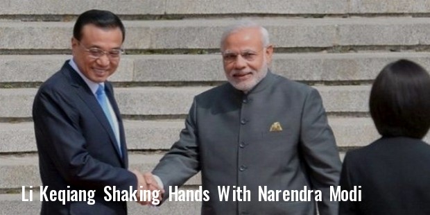 prime minister narendra modi and chinese premier li keqiang  l  shake hands