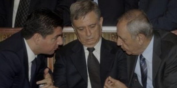syrian vice president abdul halim khaddam, center, listens to bahaa hariri, son of the slain former prime minister