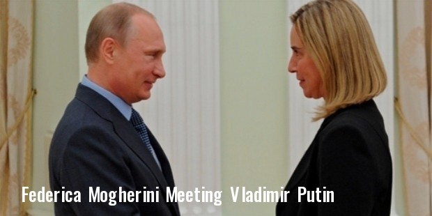 talian foreign minister federica mogherini being welcomed by russian president vladimir putin