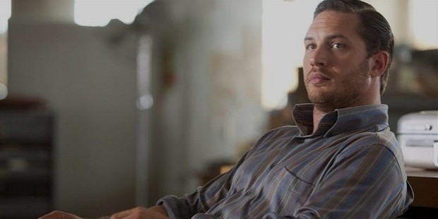 tom hardy, who will play the villain bane, in the dark knight rises