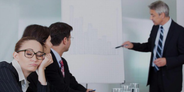 woman sleeping during business meeting