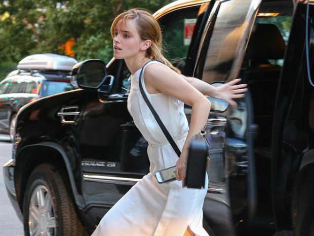 Emma coming out from her Cadillac Escalade