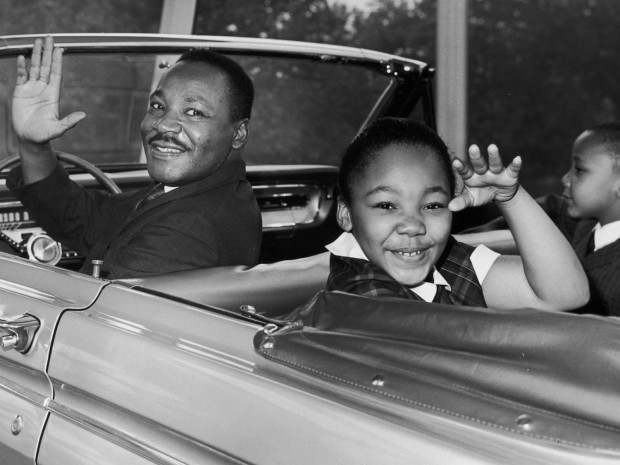 Martin Luther King with his kids in his car
