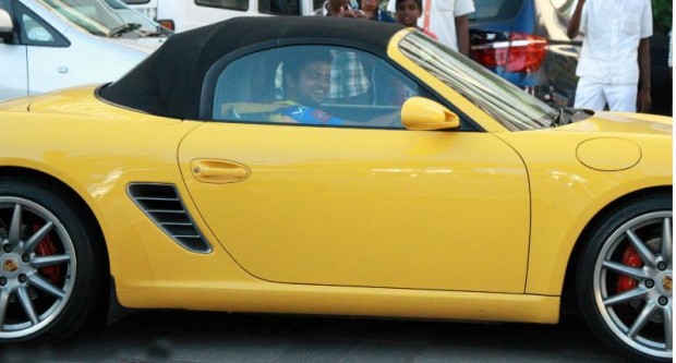 Raina in his Porsche