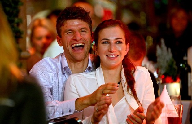 Thomas Muller and his wife Lisa at a party