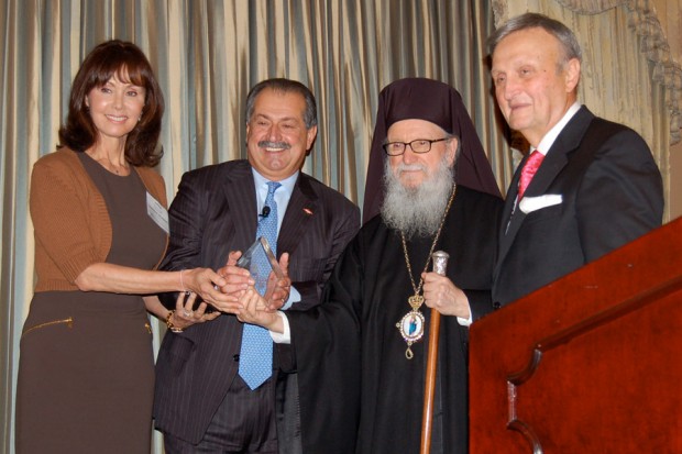 Andrew Liveris and his wife with Archbishop Demetrios and G. Caras