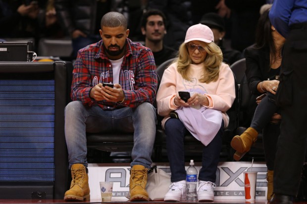 Drake and His Mom during Raptors Basketball Game