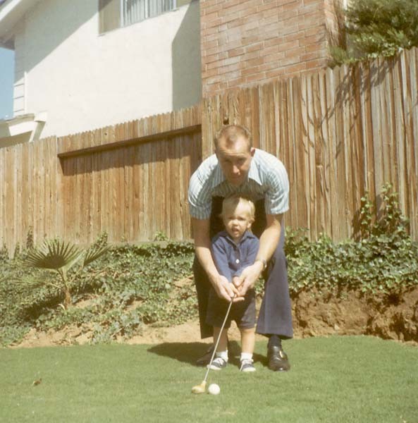 Phil with His Father in his childhood