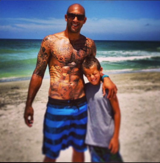 Tim and his son Jacob Howard at a beach