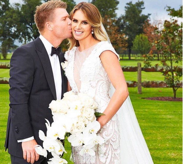 Warner and his wife Candice Warner on their wedding day