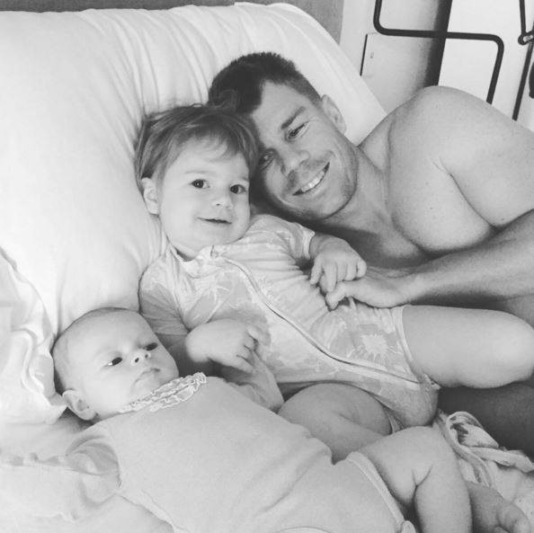 Warner with his cute daughters