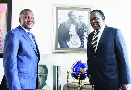 Aliko dangote with vice president Emmerson Mnangagwa