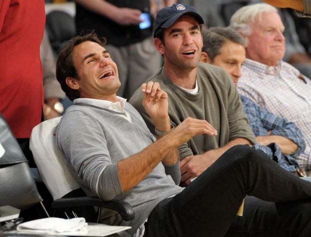 Roger Federer laughs with Pete Sampras