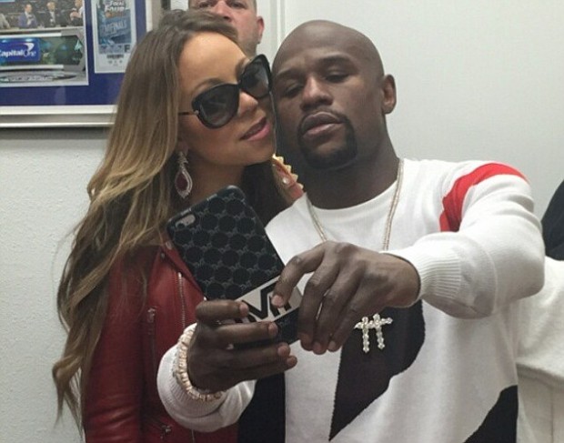 Floyd Mayweather poses with Mariah Carey for a selfie