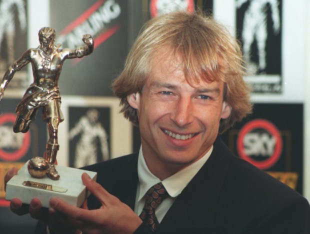 Jurgen Klinsmann with his football writer's player of the year award