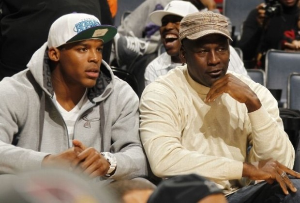 Cam Newton with Mikey