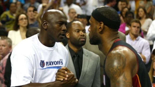 MJ shaking hands with LeBron James
