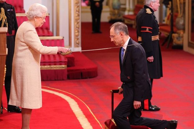 Michael Moritz is knighted by Queen Elizabeth II at Buckingham Palace