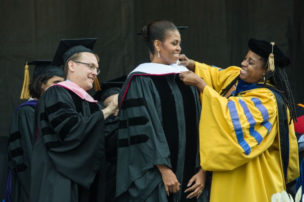 Michelle Obama is presented an Honor Sash during Oberlin College Commencement Ceremony
