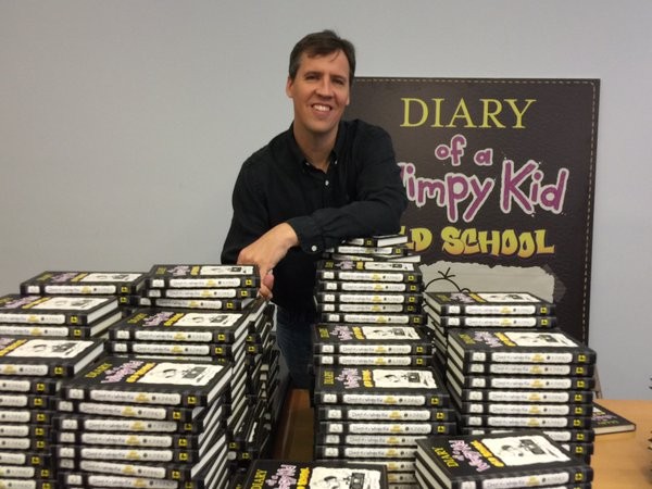 Jeff Kinney with His Books