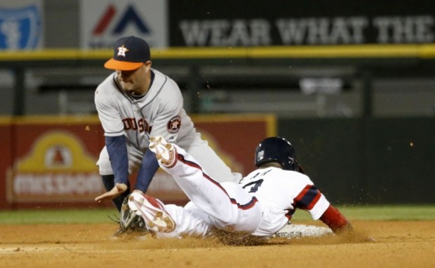 Alejandro De Aza, right, steals second base during the Seventh inning