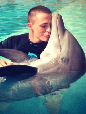 Colton Haynes Playing with Dolphin