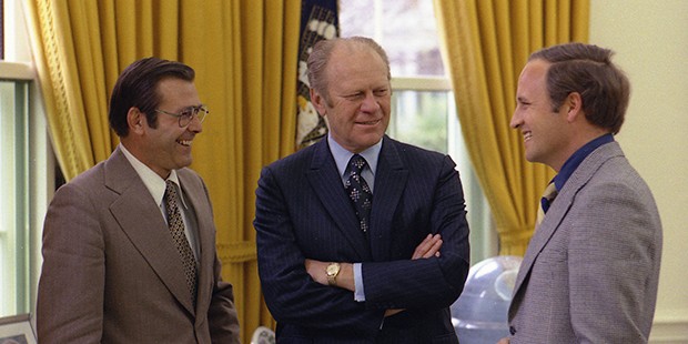 White House Chief of Staff Donald Rumsfeld (left) and his assistant Cheney (right) meet with President Gerald Ford at the White House
