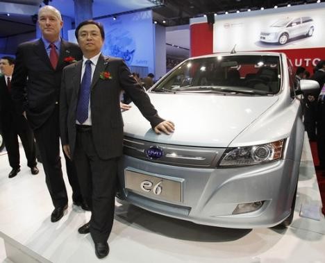 Wang Chuanfu Posing with His Hybrid Car
