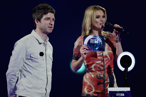 Kate Moss and Noel Gallagher onstage at The BRIT Awards 