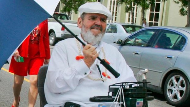 Chef Paul Prudhomme in 2008 leads a New Orleans jazz band through the historic French Quarter