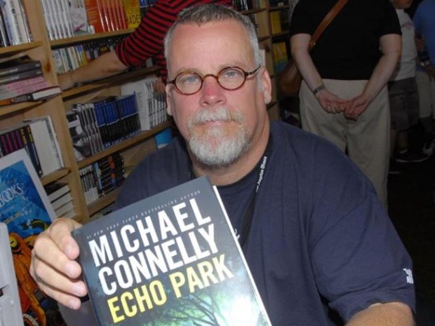 Michael Connelly With His Book