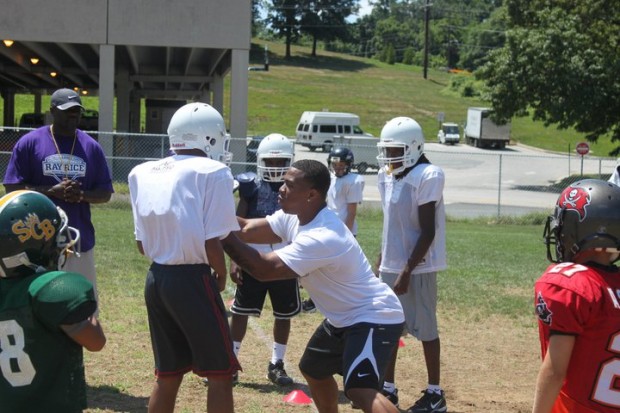 Ray Rice sharing some tips with young players