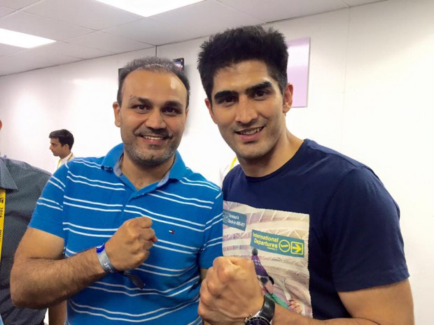 Indian Cricket star Virender Sehwag with Vijender